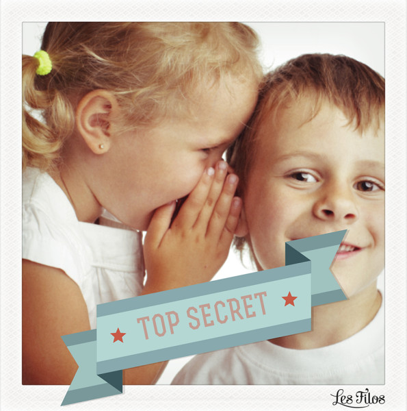 Girl whispers a secret